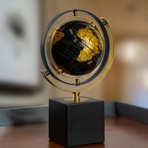 Decorative black and gold world globe
